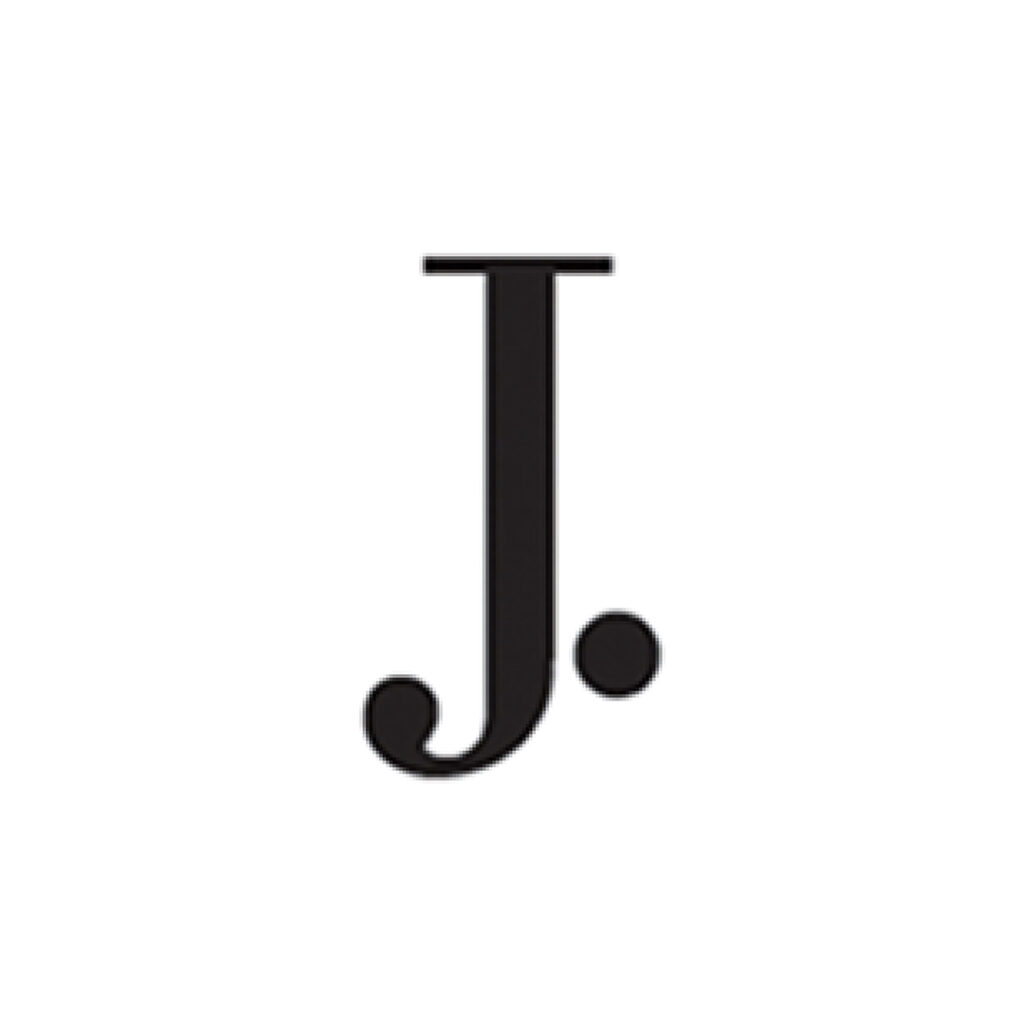 J.